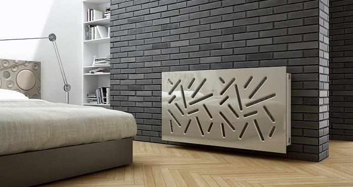 Stylish bedroom with a modern bed, lamp and a radiator cover on a grey brick wall